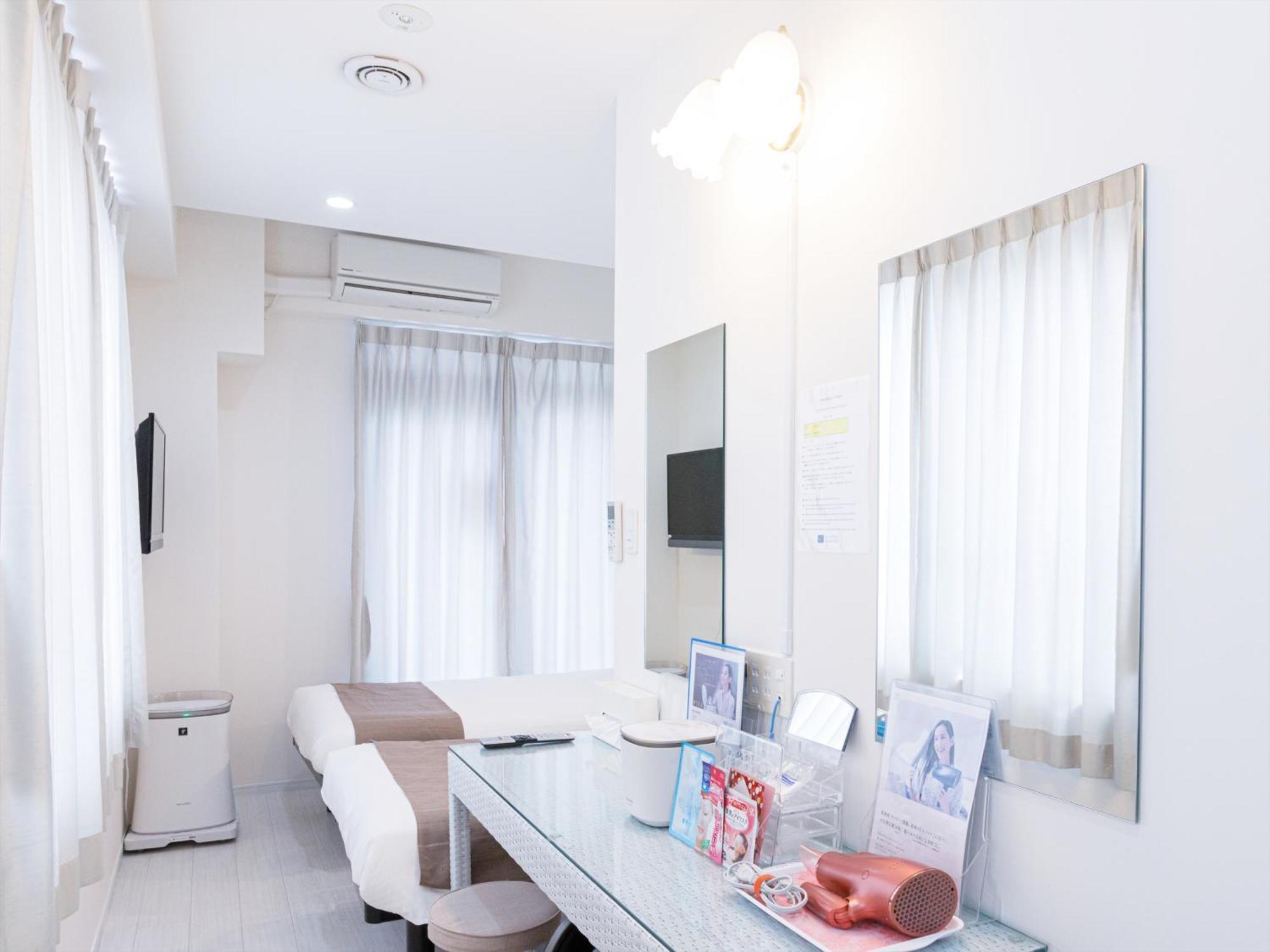 かりゆしコンドミニアムリゾート那覇スカイリビングホテル旭橋駅前 Naha Room photo